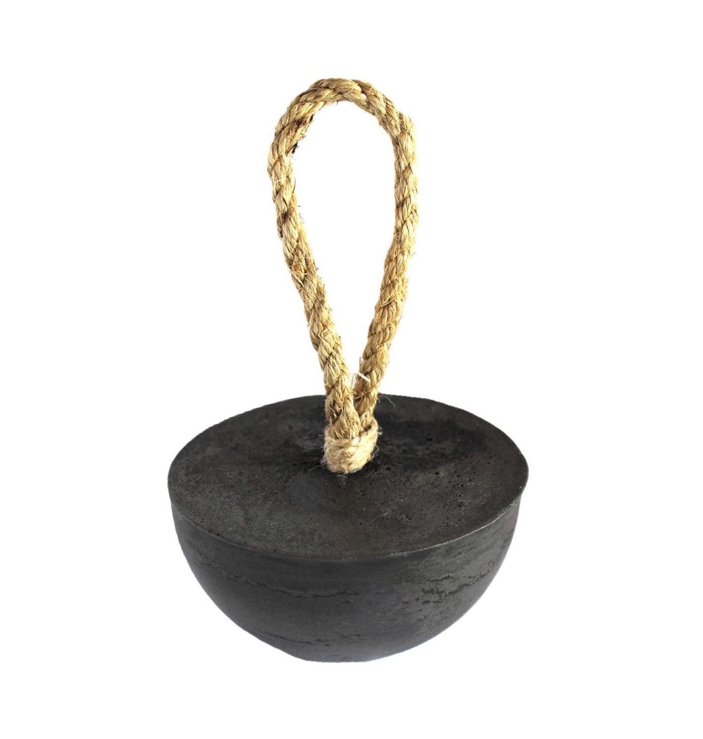 Charcoal grey concrete dome door stop with natural sisal rope handle.