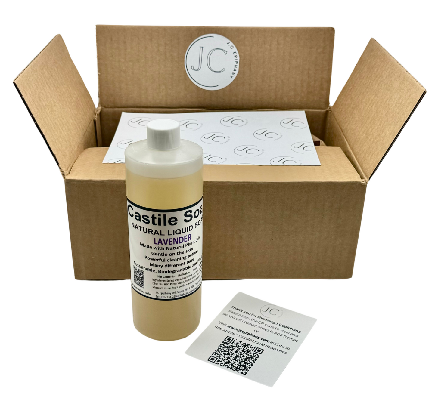 JC Epiphany Lavender Castile Soap bottle in front of branded shipping box with JC tissue paper and printed product card – natural liquid soap made with plant-based ingredients.